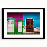 Colorful abstract art print of a vibrant Central American scenery on a textured, extra large canvas, framed in black.