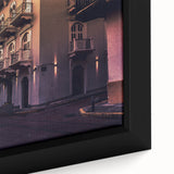 Close-up of extra large black wall art featuring a colorful, textured Central American scenery on framed canvas.