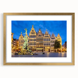 Abstract art print of a European landscape in muted gold and blue tones, framed with a golden mat.