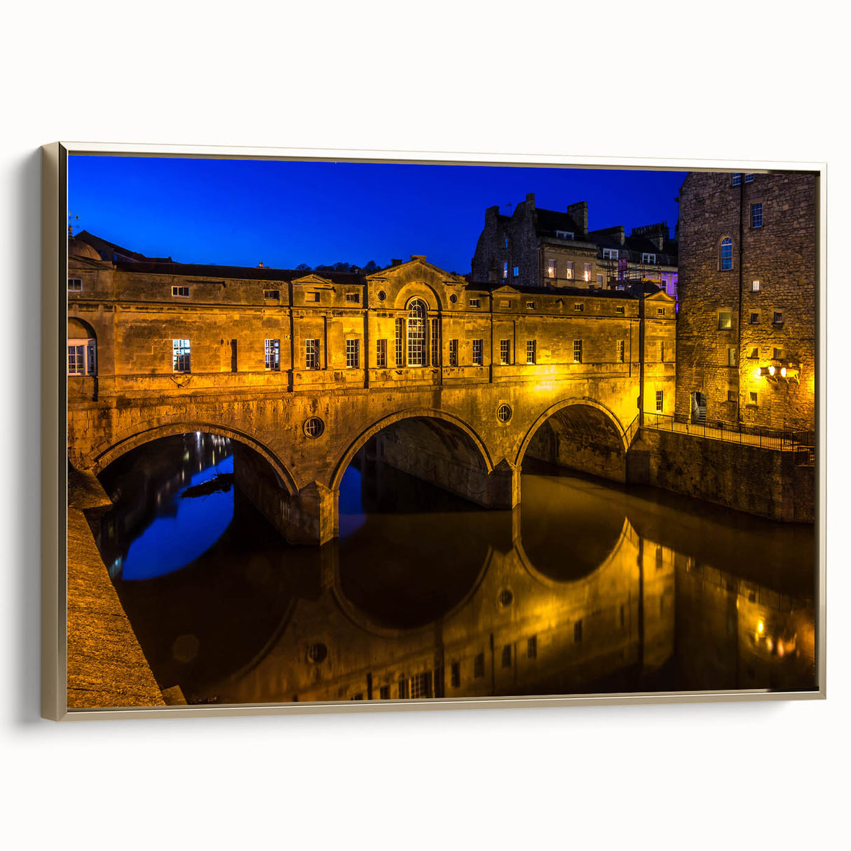 Framed canvas of a vintage-style landscape painting depicting the English city of Bath, featuring muted earth tones.