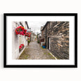 Extra large abstract art print depicting a colorful, textured scenery of Cumbria, England, in a black frame.