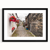 Extra large abstract art print depicting a colorful, textured scenery of Cumbria, England, in a black frame.