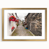 Abstract art print of Cumbria's landscape in muted earth tones on a framed canvas, suitable for dining room decor.