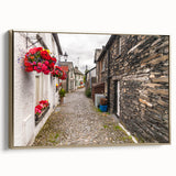 Framed canvas featuring a vintage landscape painting of Cumbria, England, in muted earth tones, ideal for bedroom wall art.