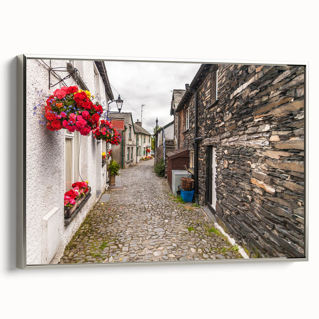 Landscape art painting of Cumbria, featuring muted earth tones, on a silver-framed canvas, suitable for living room decor.