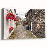 Landscape art painting of Cumbria, featuring muted earth tones, on a silver-framed canvas, suitable for living room decor.
