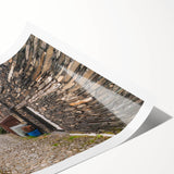 Extra large wall art featuring line art flowers in muted earth tones on a rolled canvas.