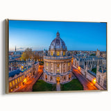Framed canvas depicting a vintage-style Oxford landscape in black and gold tones, ideal for bedroom wall art.