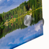 Large abstract wall art depicting a serene Finnish landscape in muted blues and greens on an acrylic glass.