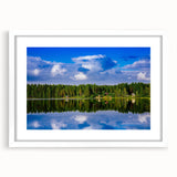 Textured abstract art print of a serene Finnish landscape in muted earth tones on a framed white canvas.