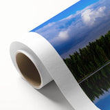 Art Deco style poster of a serene Finnish landscape in cool blue and green tones, printed on rolled canvas.