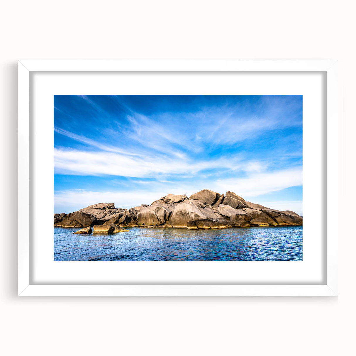 Textured abstract art print of a Corsican landscape in muted earth tones, framed with a white mat.