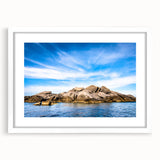 Textured abstract art print of a Corsican landscape in muted earth tones, framed with a white mat.