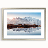 Extra large wall art featuring an abstract print of the French Alps in textured tones of gray and blue, framed in silver.