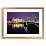Abstract art print of Lyon cityscape in muted gold and blue tones on a framed canvas.
