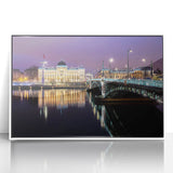 Mid-century modernist art depicting Lyon, France in muted gray and blue tones on a framed acrylic.