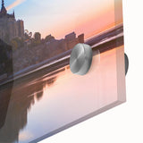 Large abstract wall art depicting a European scenery in muted earth tones on acrylic glass.