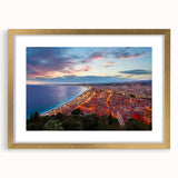 Abstract art print of Nice, France in muted blue and gold tones on a framed canvas, suitable for dining room decor.