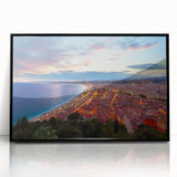 Large abstract wall art depicting a stylized European cityscape in muted blue and gray tones on a framed acrylic.