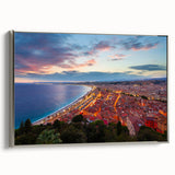 Framed canvas depicting a vintage-style landscape of Nice, France, with colorful art in black tones.