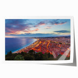 Rolled print of Nice, France scenery with muted floral elements, ideal for dining room wall art.