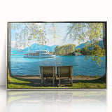 Large art print of a Bavarian landscape in muted greens and blues on a silver-framed acrylic.