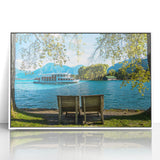 Mid-century modernist art of a Bavarian landscape in muted green and blue tones on a white framed acrylic.