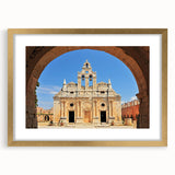 Abstract art print of a European landscape in Crete with muted earth tones on a framed gold mat, ideal for dining room decor.