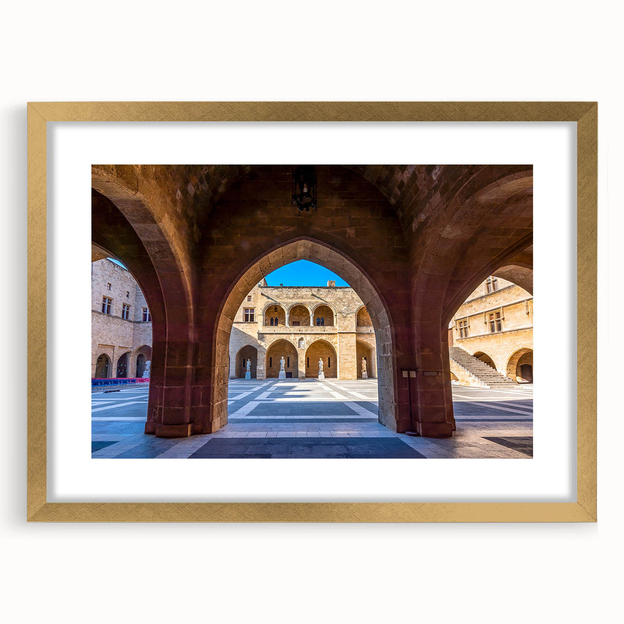 Abstract art print of Rhodes, Greece, with muted earth tones on a framed gold mat, ideal for dining room decor.