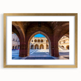 Abstract art print of Rhodes, Greece, with muted earth tones on a framed gold mat, ideal for dining room decor.