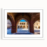 Textured art print of abstract Rhodes, Greece scenery in muted earth tones, framed with a white mat, ideal for bedroom decor.