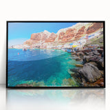 Large abstract wall art depicting the Santorini coastline in muted blue and white tones, framed in black acrylic.