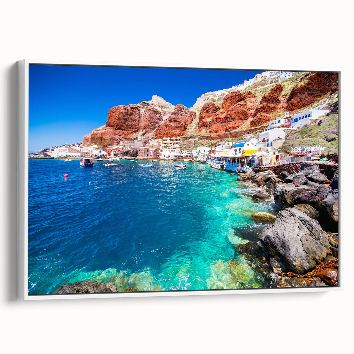 Vintage poster art of Santorini with vibrant blue and white tones on a framed canvas, ideal for living room decor.