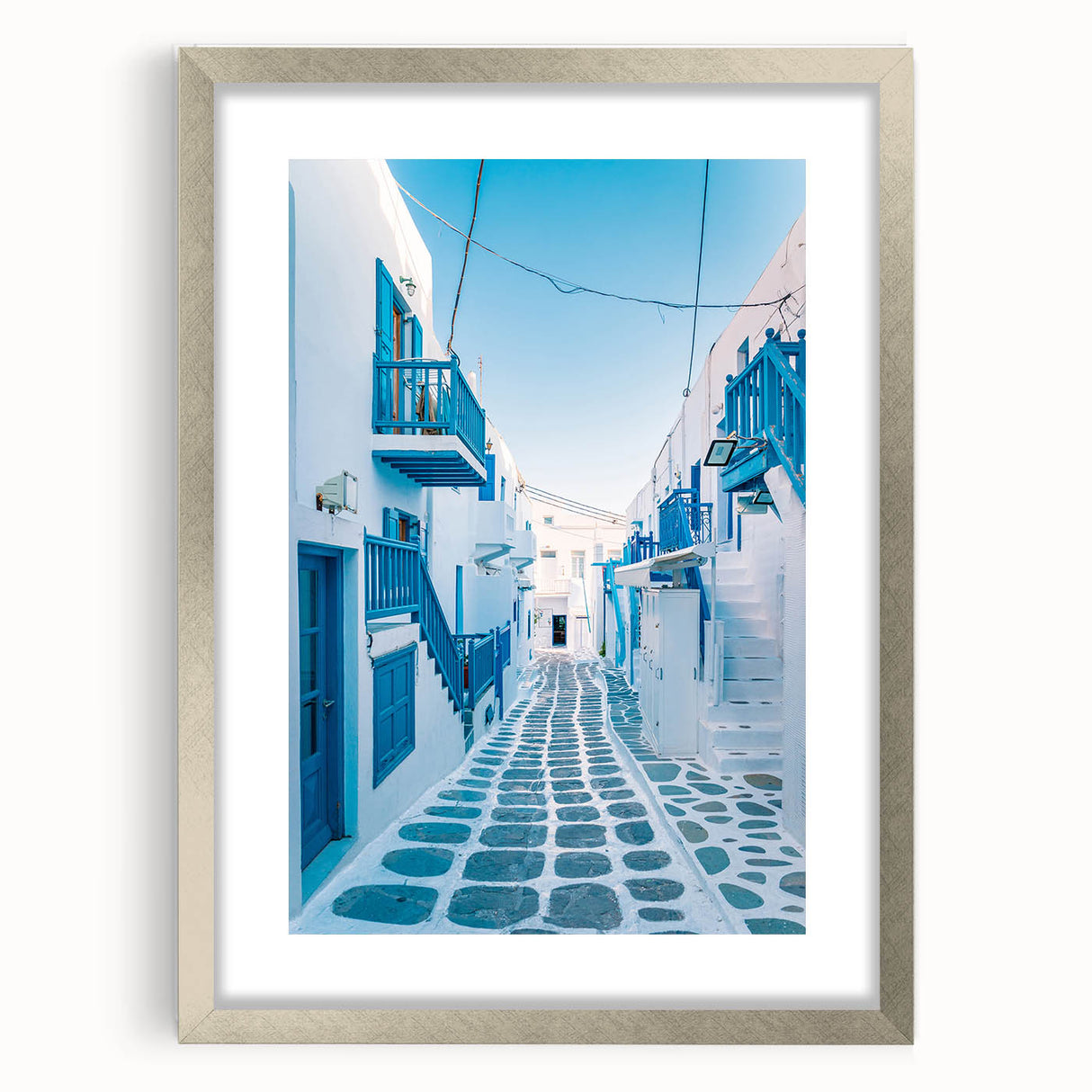 Extra large abstract art print of a Greek scenery in muted earth tones on a textured canvas, framed in silver.