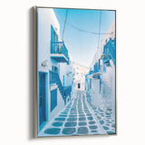 Framed canvas featuring a vintage-style landscape art painting of a Greek seaside village in vibrant colors.