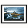 Extra large colorful art print depicting abstract Icelandic scenery, in a black frame with mat, suited for living room decor.