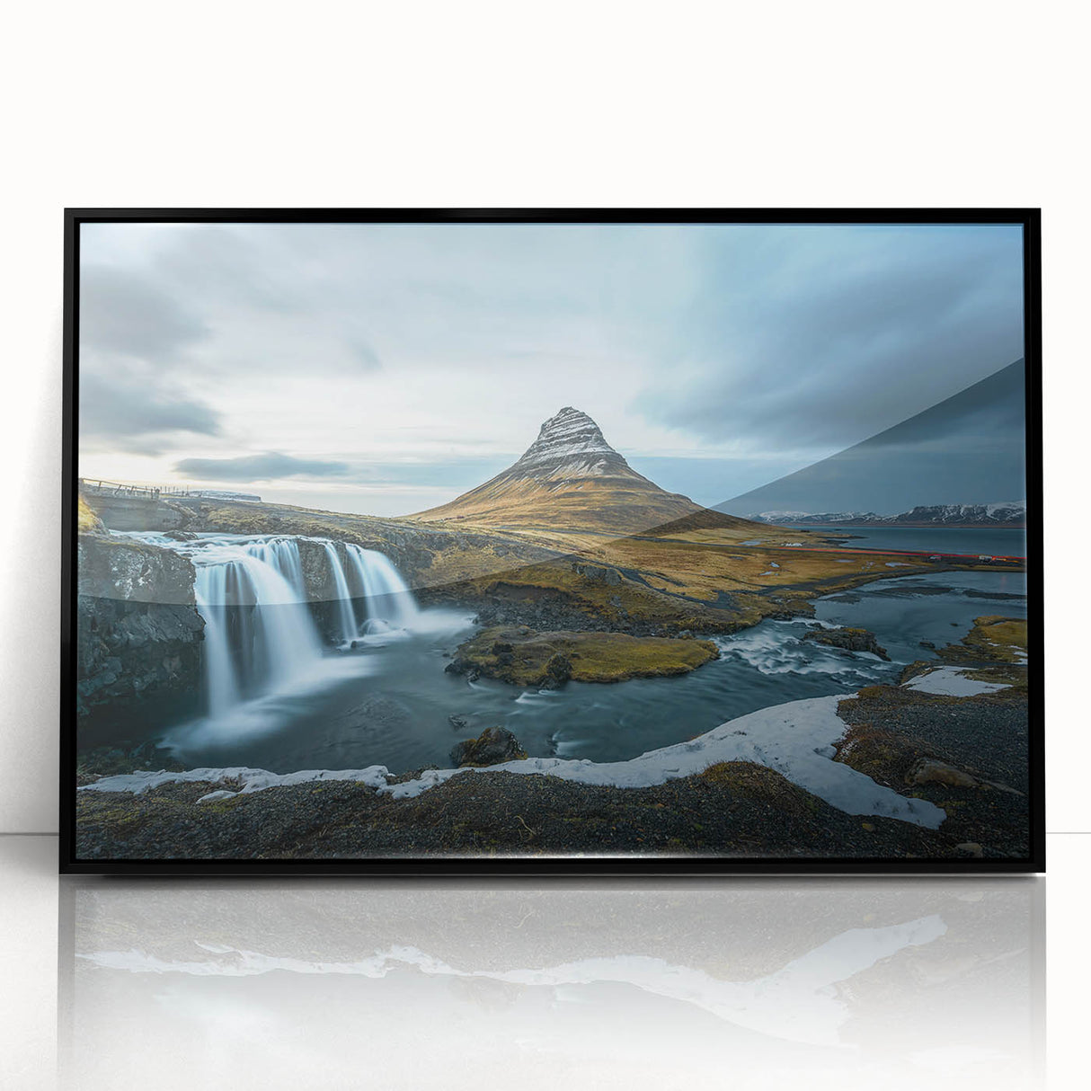 Large abstract wall art of an Icelandic landscape in muted gray and blue tones, acrylic print in a black frame.