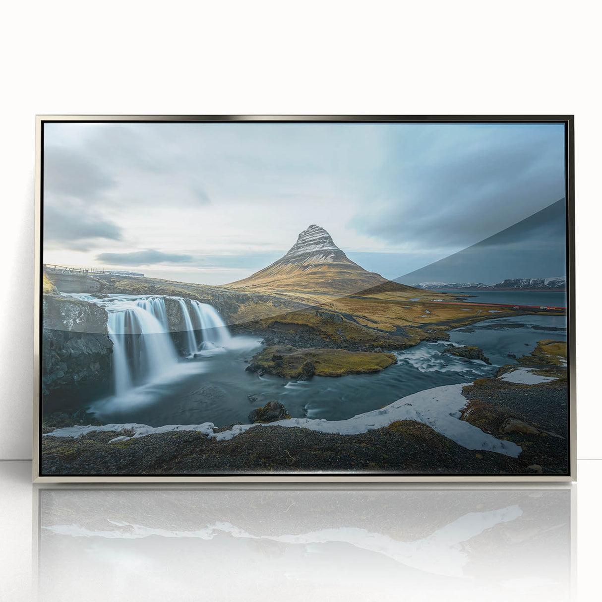 Large art print featuring a serene Iceland landscape in muted gray and blue tones on a framed acrylic.