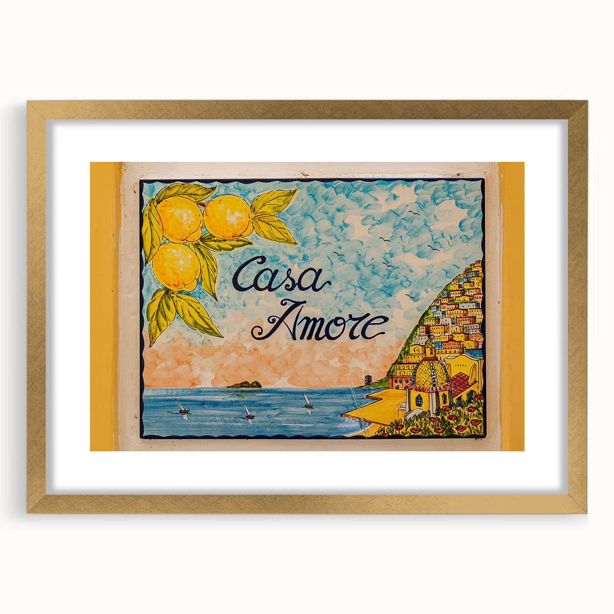 Abstract art print of the Amalfi Coast in muted blue and white tones on a framed gold mat, suitable for dining room decor.
