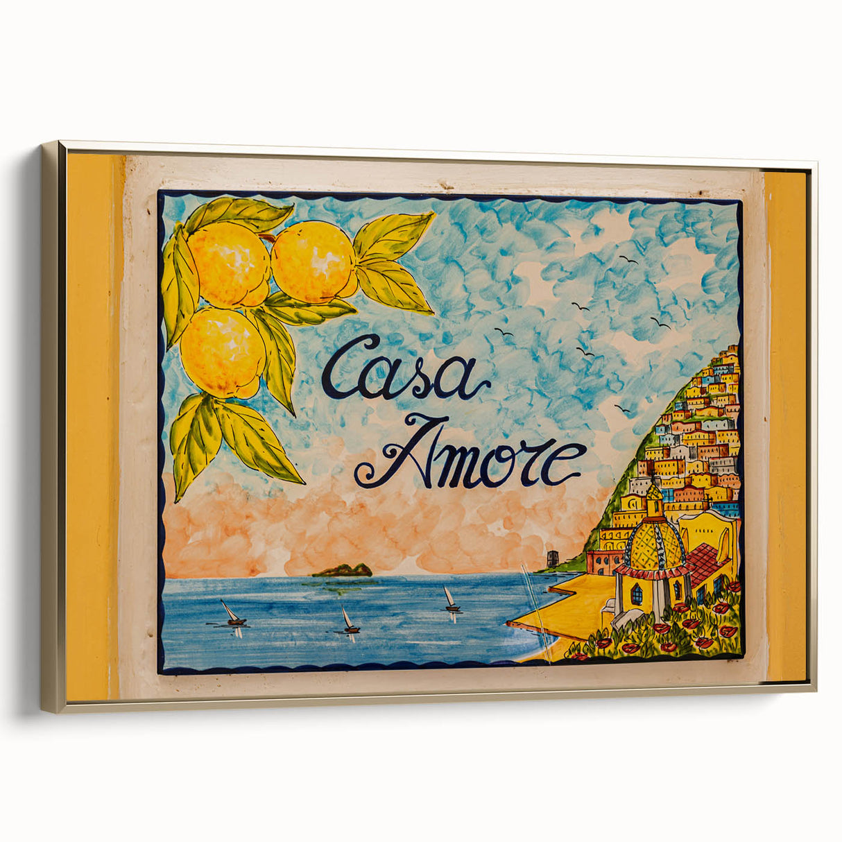 Framed canvas wall art of Amalfi Coast landscape in muted earth tones, ideal for bedroom decor.