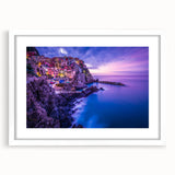 Textured art print of Cinque Terre with abstract design in vibrant colors on a white framed mat, suited for bedroom decor.