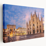 Side view of a large stretched canvas depicting a European cityscape in Milan with muted earth tones.