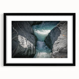 Extra large wall art featuring an abstract depiction of Mount Etna in vibrant, colorful textures on a black framed canvas.