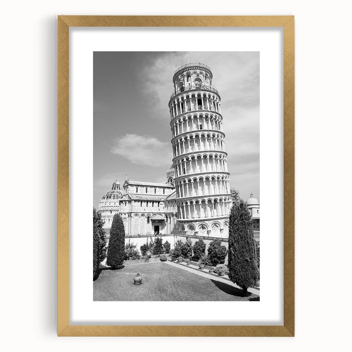 Abstract art print of the Leaning Tower of Pisa in muted gold and ivory tones, framed with a gold mat.