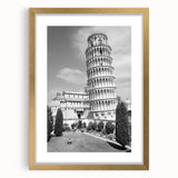 Abstract art print of the Leaning Tower of Pisa in muted gold and ivory tones, framed with a gold mat.