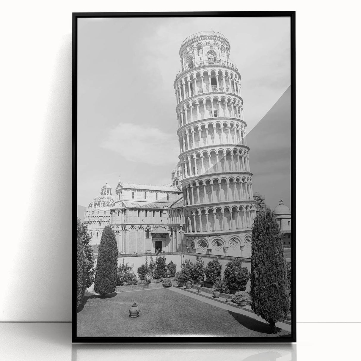 Large abstract wall art of the Pisa scenery in muted earth tones, framed in black acrylic.