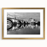 Abstract art print of Rome scenery in muted gold tones, framed with a mat, suitable for dining room decor.