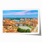Extra large rolled print of a Tuscany landscape with vibrant green fields and a clear blue sky.
