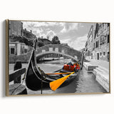 Framed canvas of a vintage Venice landscape in muted gold and black, ideal for bedroom wall art.