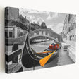 A stretched canvas print of Venice's scenic canal in muted earth tones, suitable for kitchen wall art.